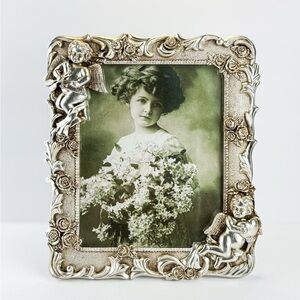 Vintage Silver Photo Frame with Cherub Accents